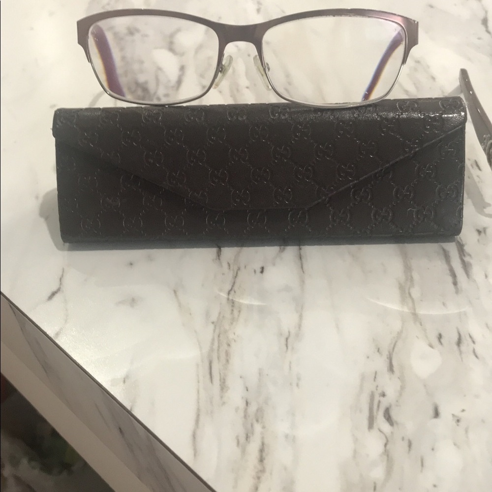 2 pair’s authentic Gucci and Dior